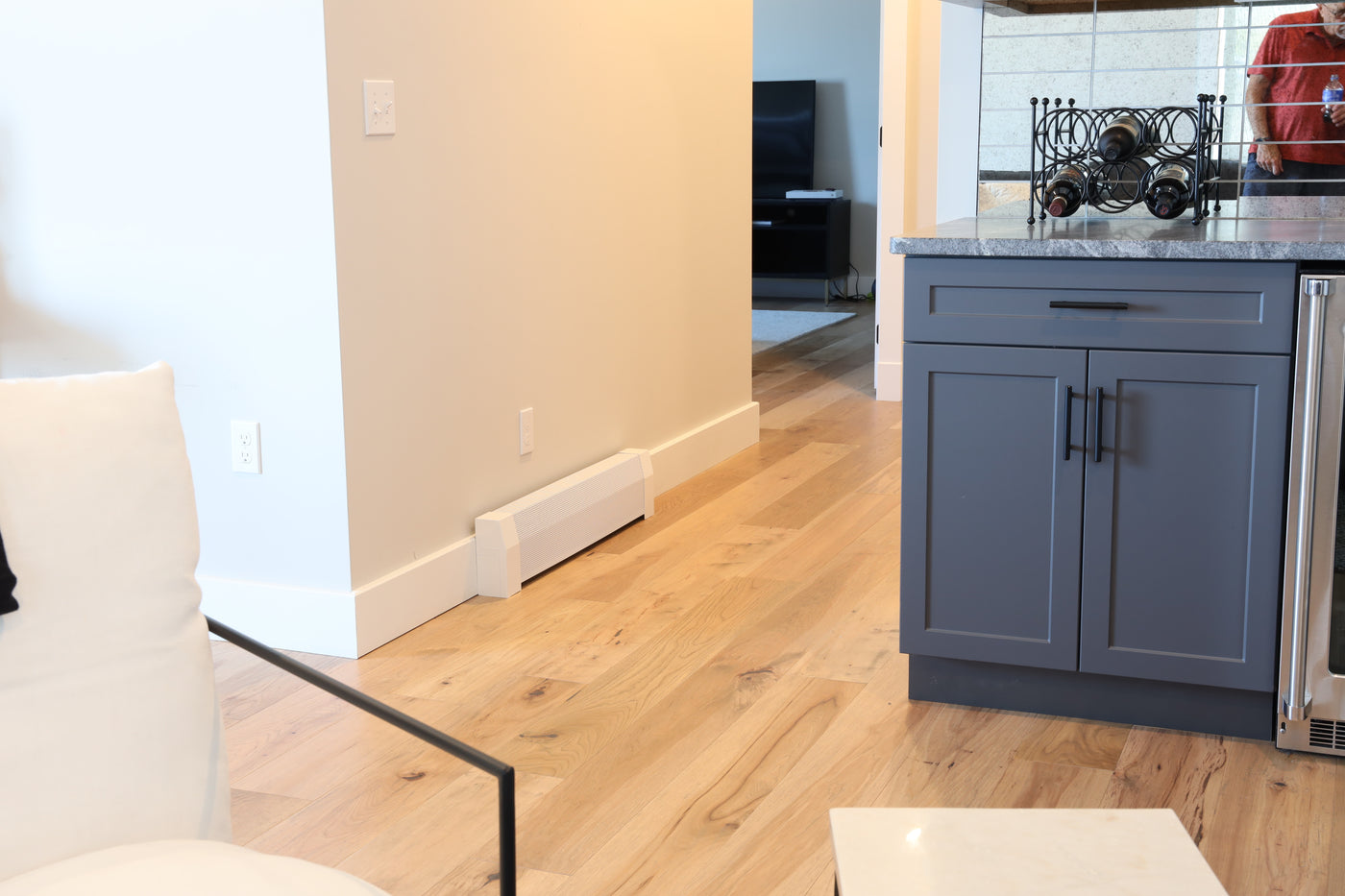 Room with new baseboard heater cover installed